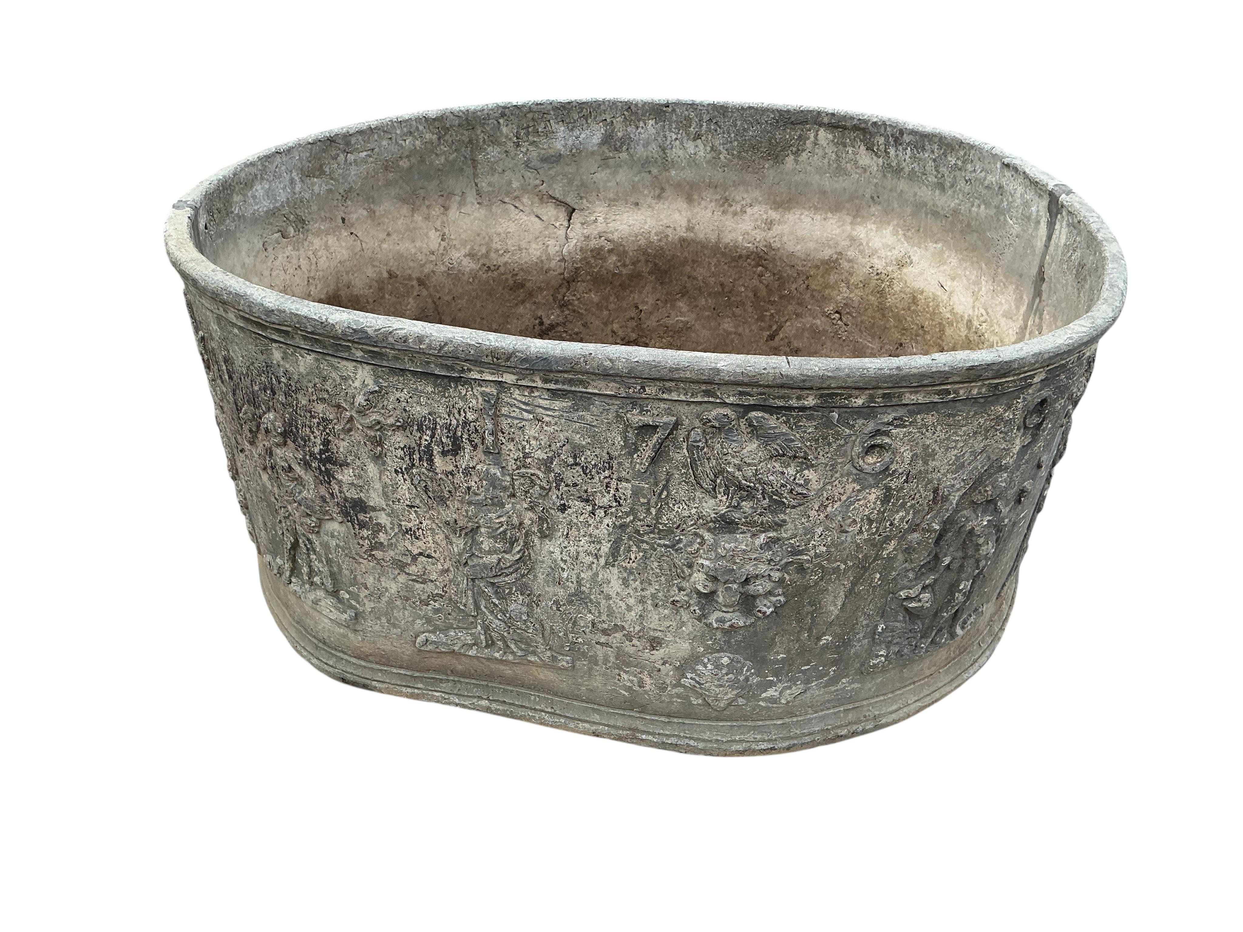 A pair of George III lead planters, dated 1769, width 67cm, height 88cm